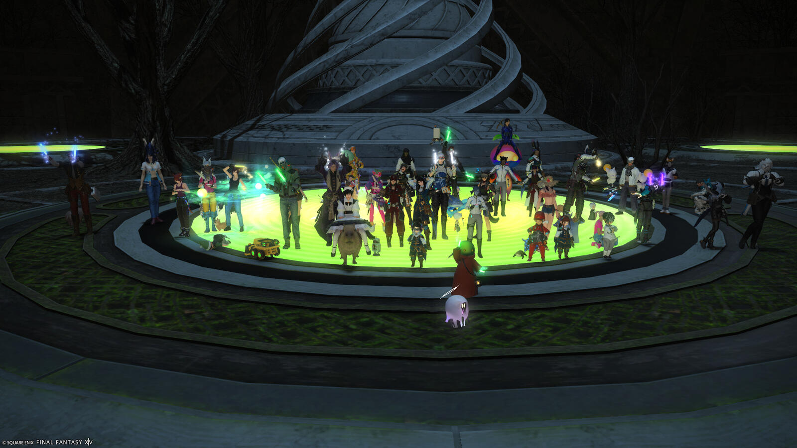 A gathering of Warriors of Light stand before the newly-revealed Rooting Towerling, presently not activated, leaving most of the cavern shrouded in darkness.