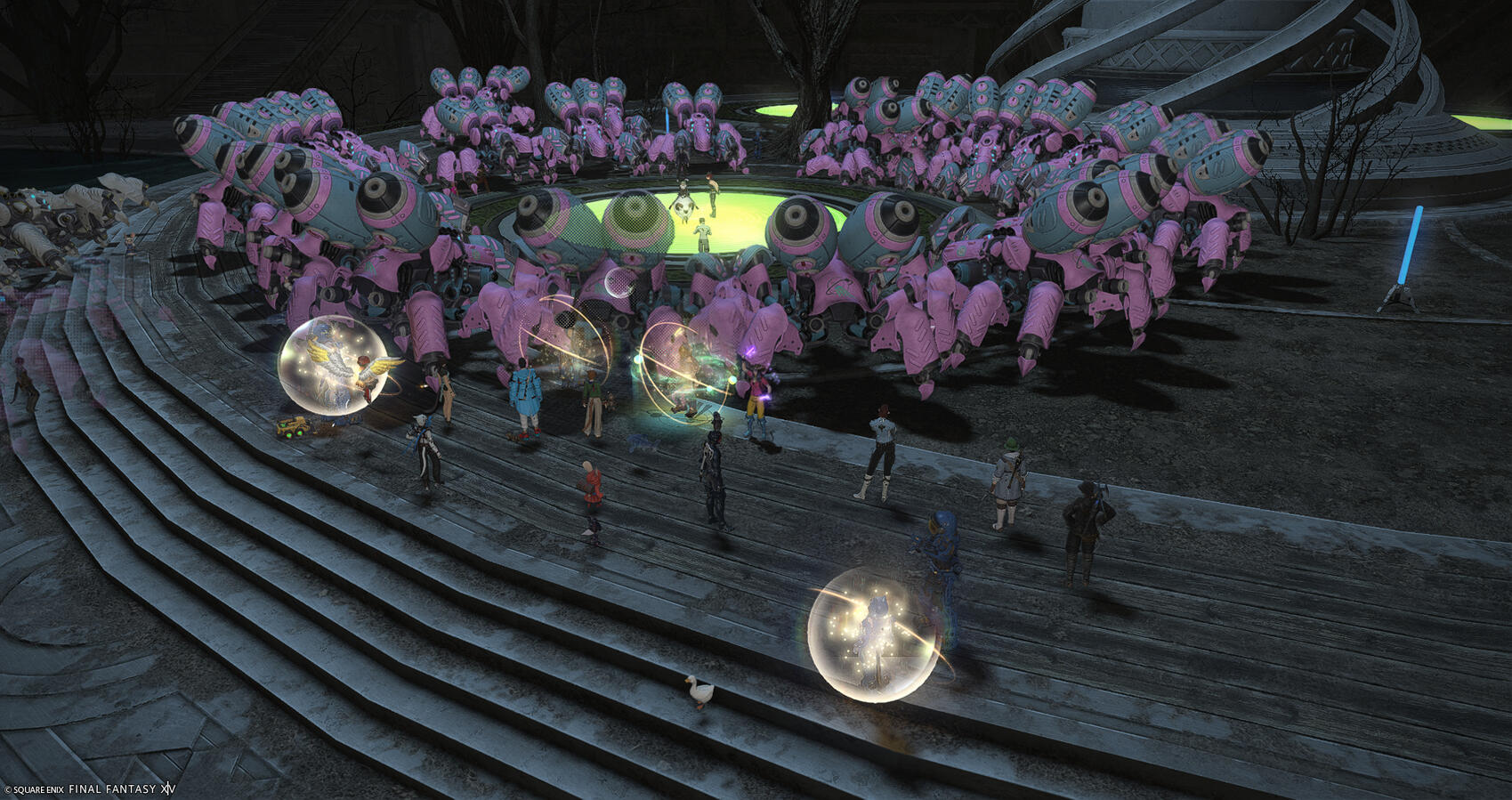 Many Warriors of Light in the Trans-Pride colored spider mechs gather at the base of the withered Rooting Towerling, forming a big circle.