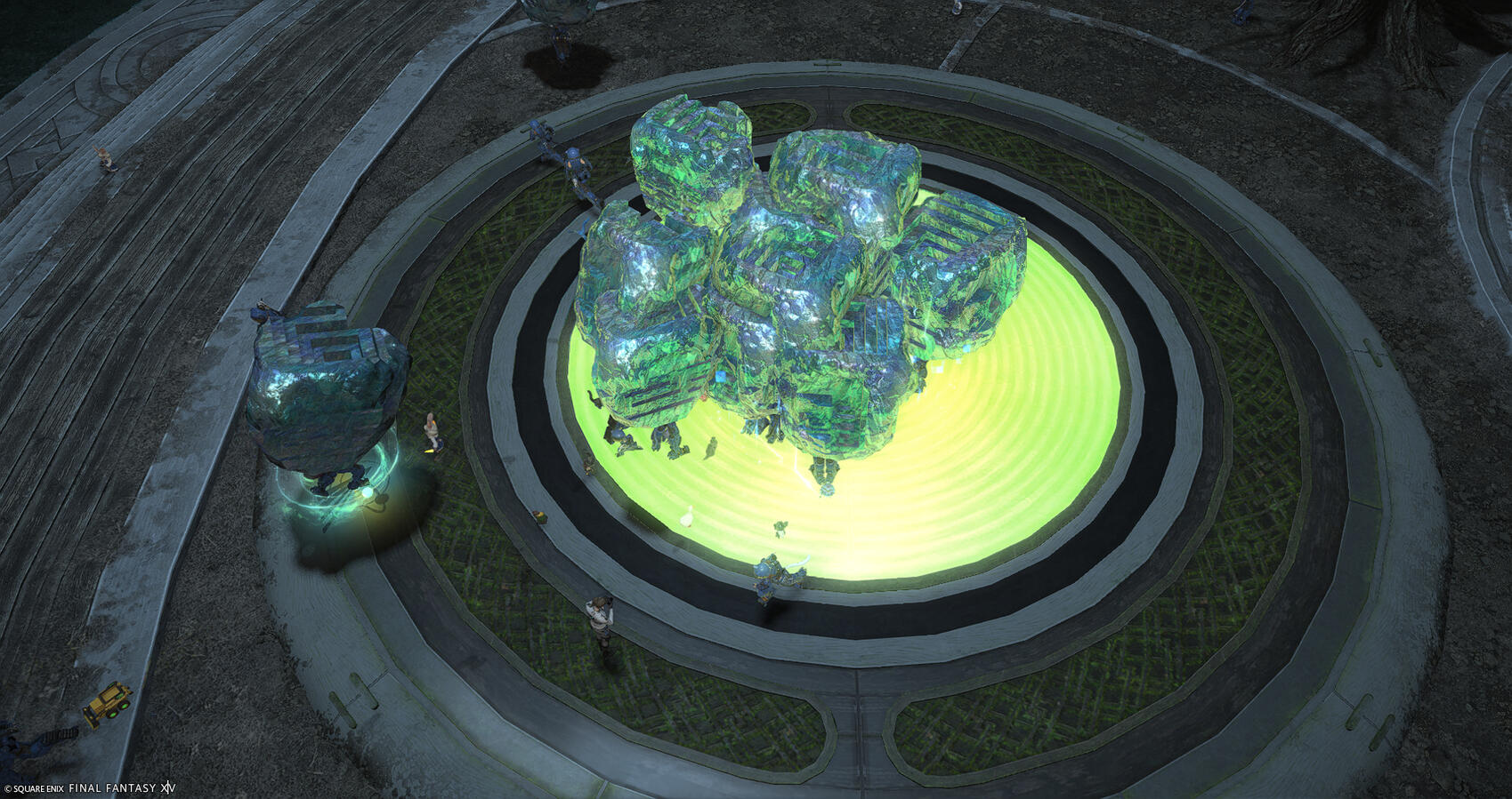 Warriors of Light present the massive blocks of stone they've been carrying to the power conduit in the center of the glowing green circle at the base of the Rootling Tower. The conduit absorbs the stones, and the Warriors of Light leave to fetch more.