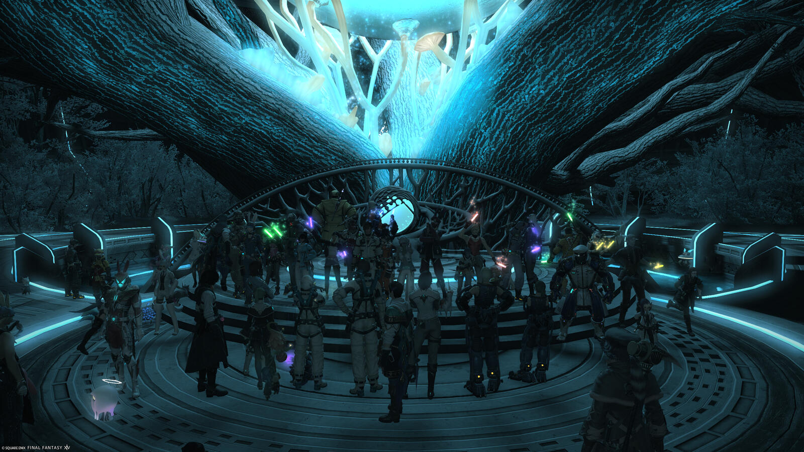 A group of warriors of light celebrate with colorful light-sticks in the cool, aqua glow of the revived Grandma Laurel tree at the core of Auxesia (instance 2 crew).